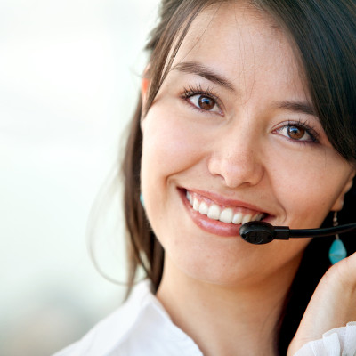 Customer Services Operator customer services operator woman smiling at the office