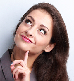 Beautiful Young Business Woman Thinking And Looking Up Beautiful young business woman thinking and looking up on blue background
